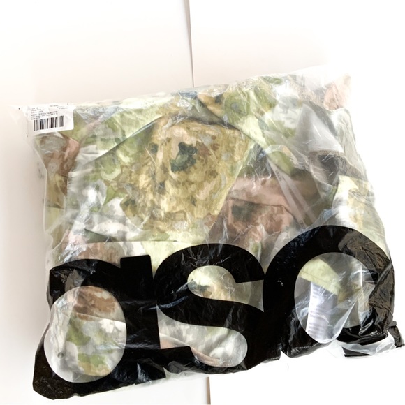 ASOS DESIGN Halter mini dress with bow back in floral print - Picture 11 of 14